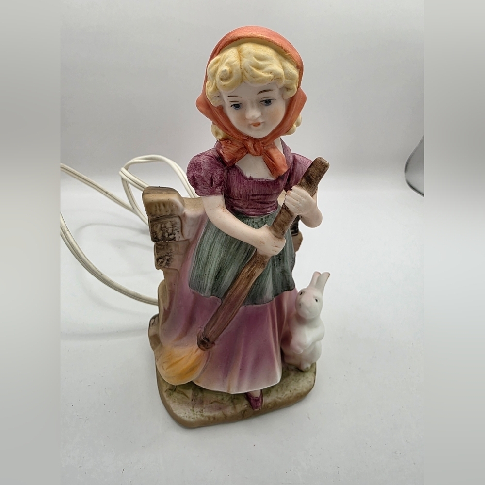 Vintage Figurine with Broom and Rabbit